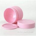 Lege zwart wit roze cosmetische crème container